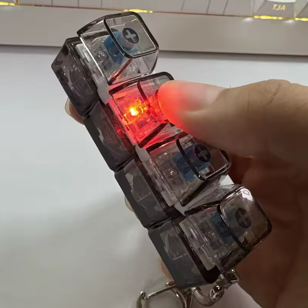 LumiCalm llavero de teclado anti estrés